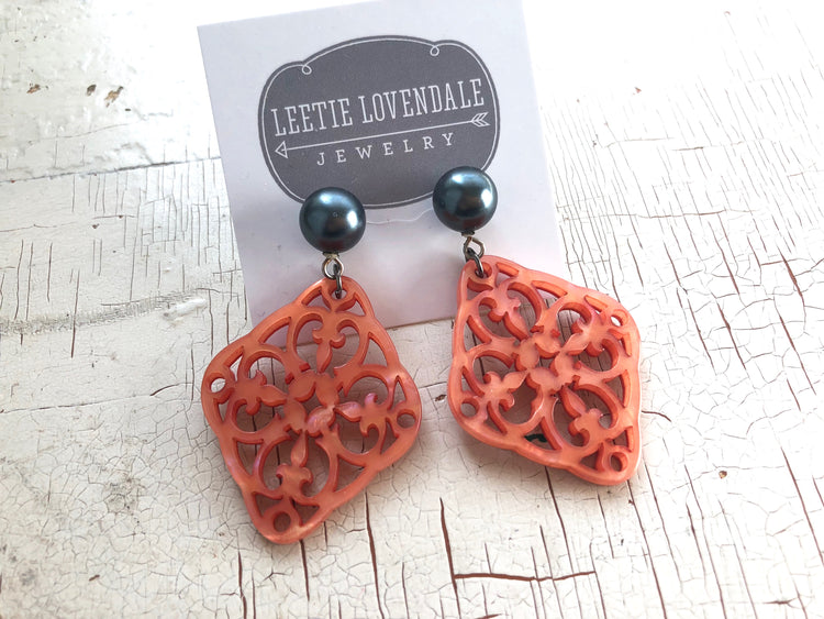 coral filigree statement earrings