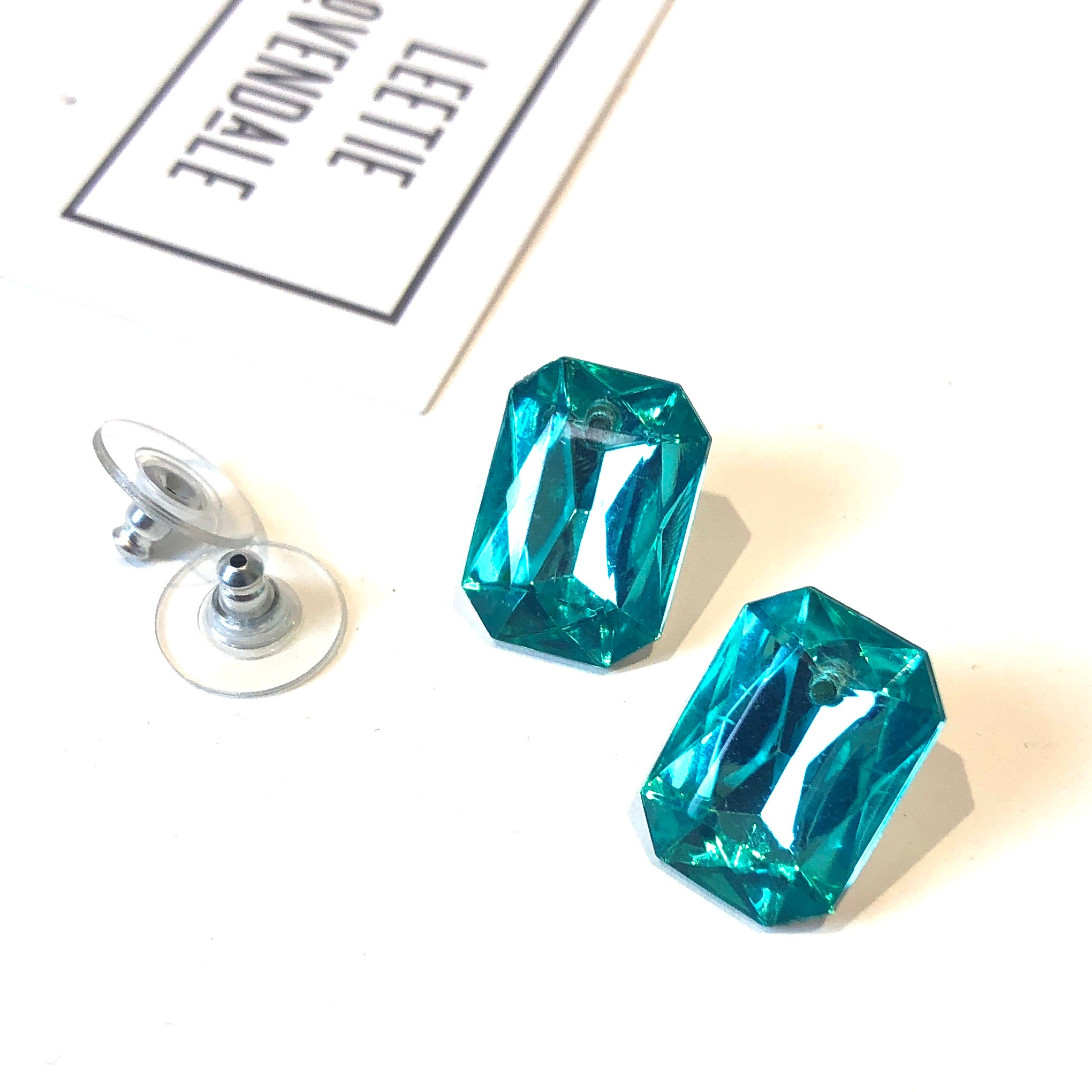 green faceted studs