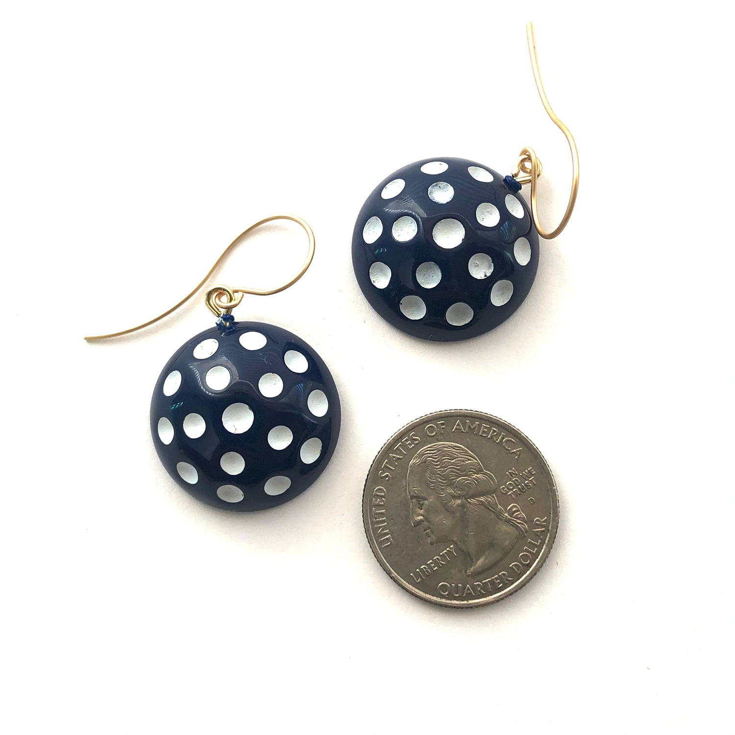 blue polka dotted earrings