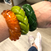 stacks of resin bracelets