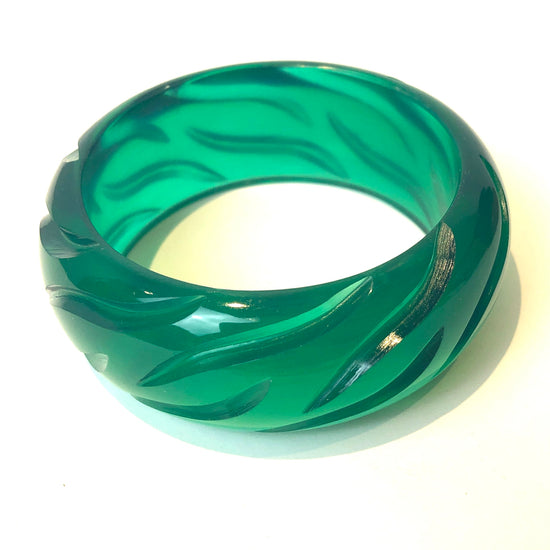 green carved bracelet