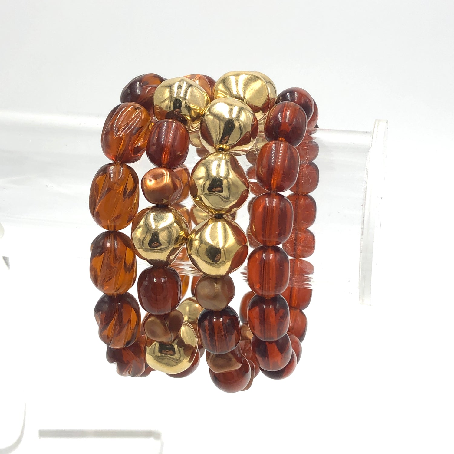 brown and gold bracelets
