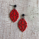 carved red statement earrings