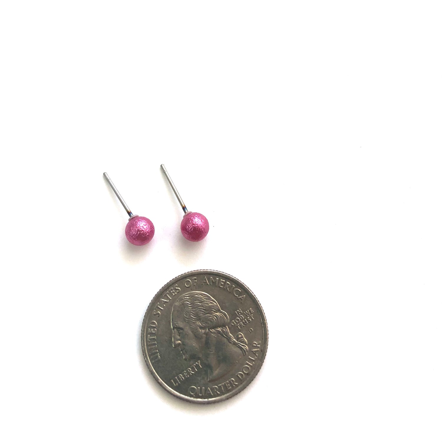 pink luster stud earrings
