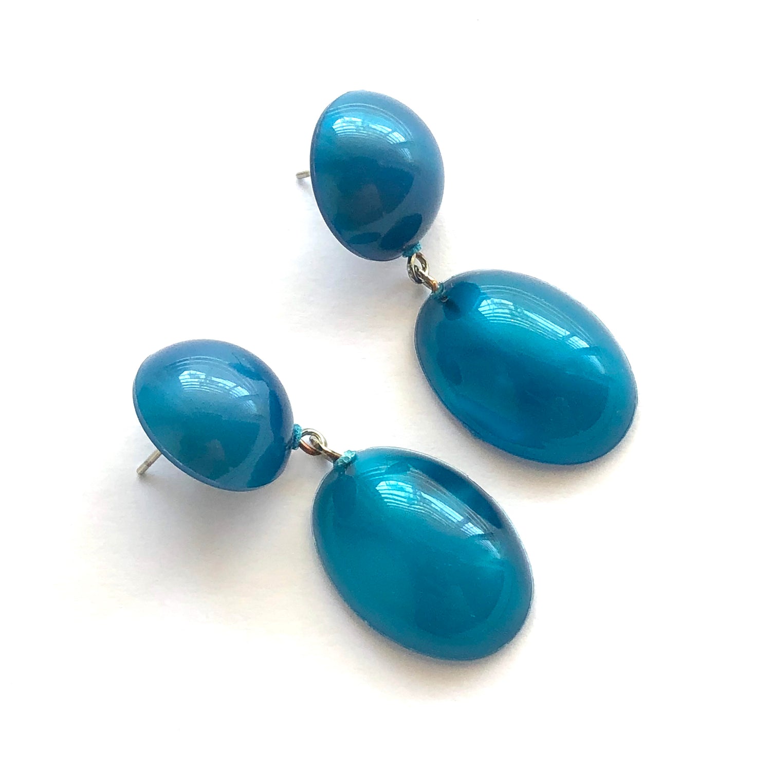 teal blue statement earrings