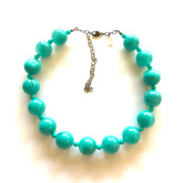 green marco necklace