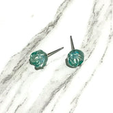 green carved flower studs