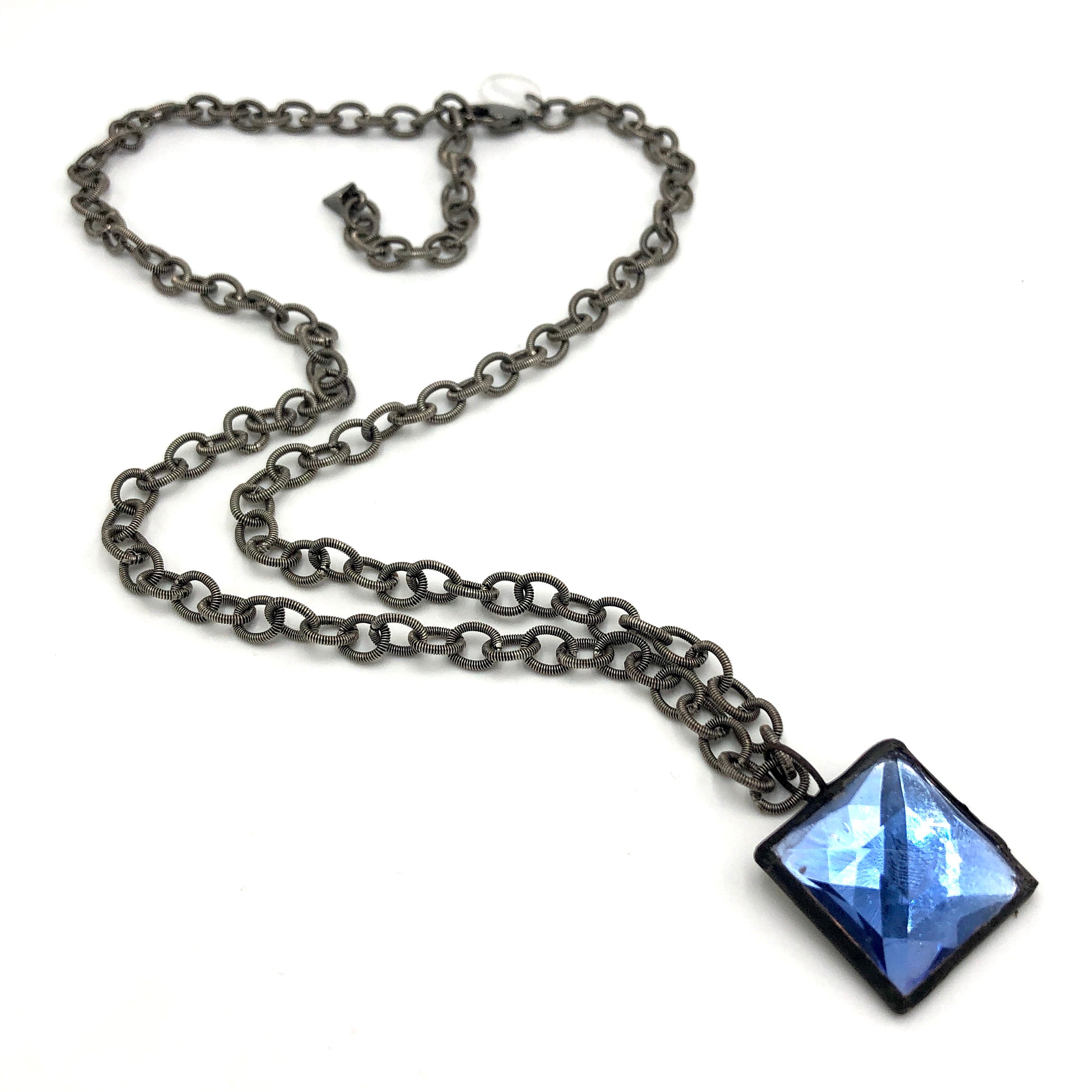 blue faceted pendant necklace