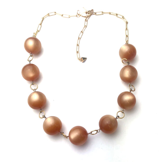 beige moonglow gold necklace