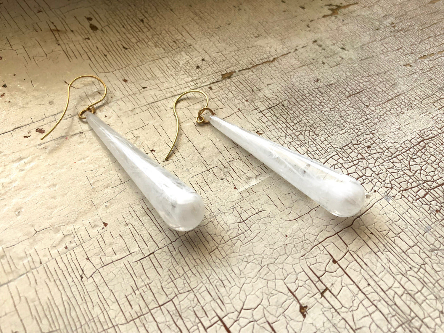 big white earrings