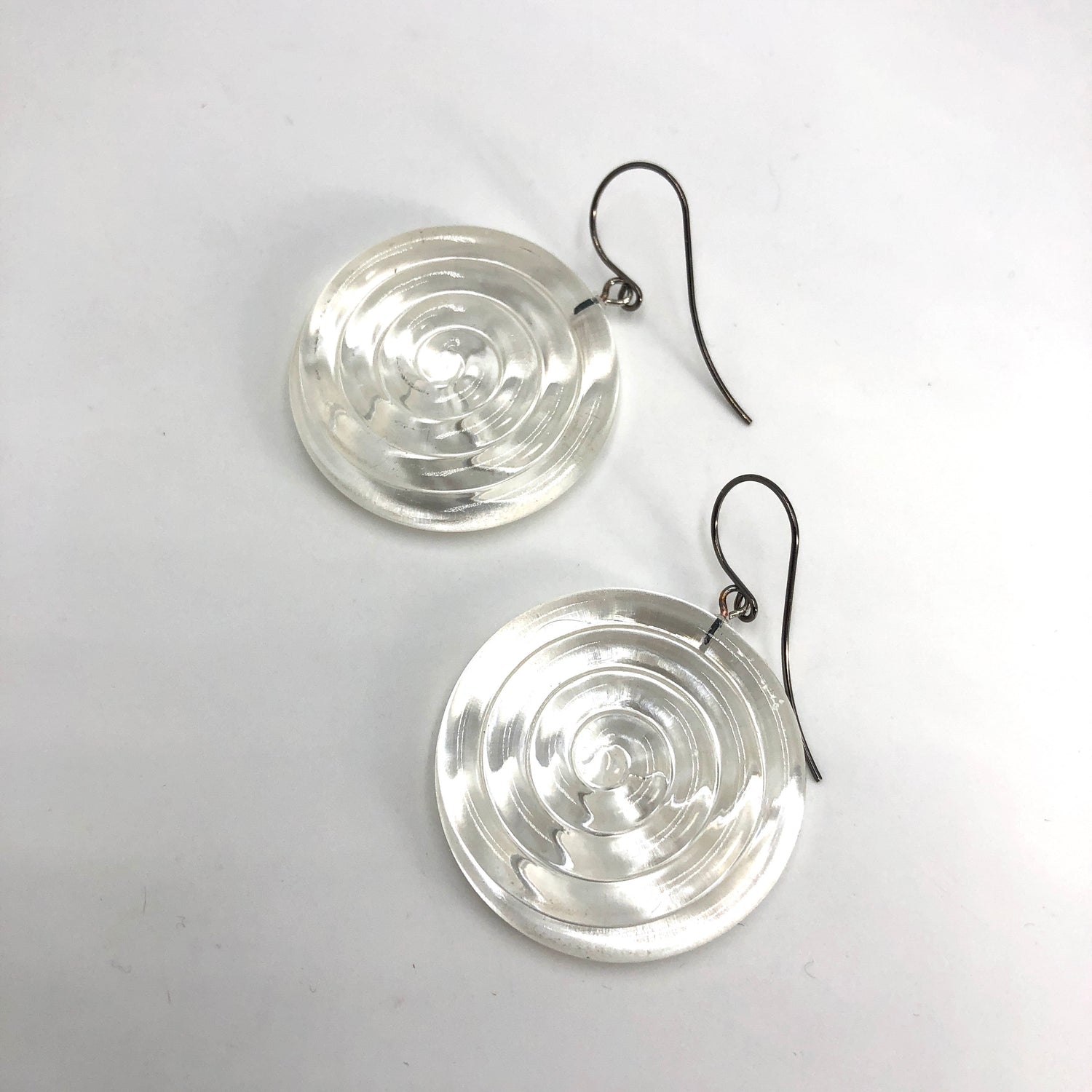 Clear &amp; Glow Spiral Drop Earrings