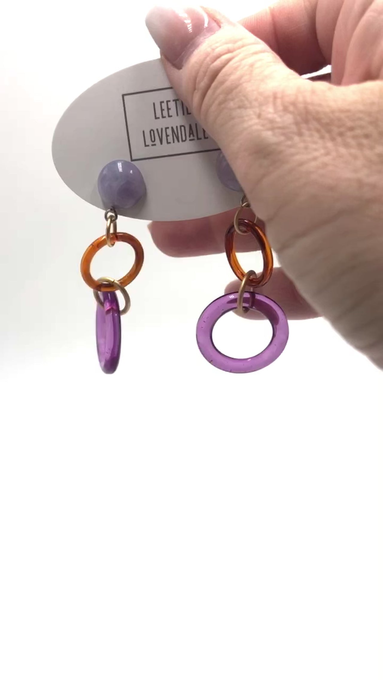 video of purple earrings
