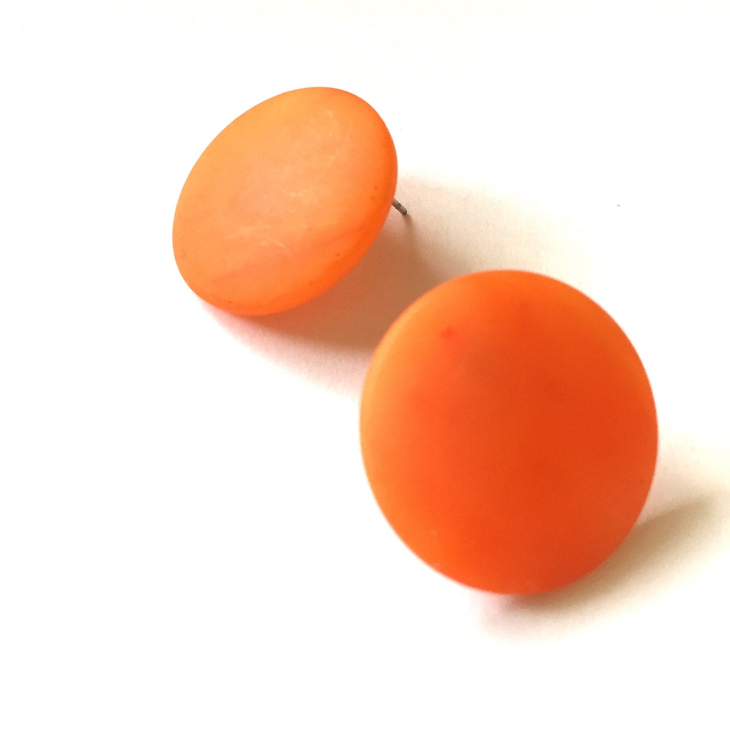 orange disc studs