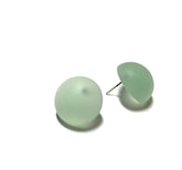 button earrings light green