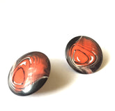 orange black stud earrings