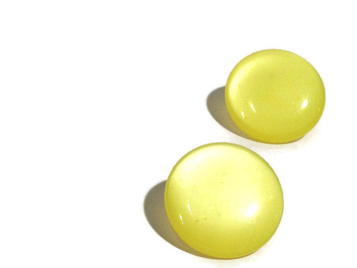 yellow button studs