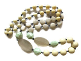 neutral long beaded necklace