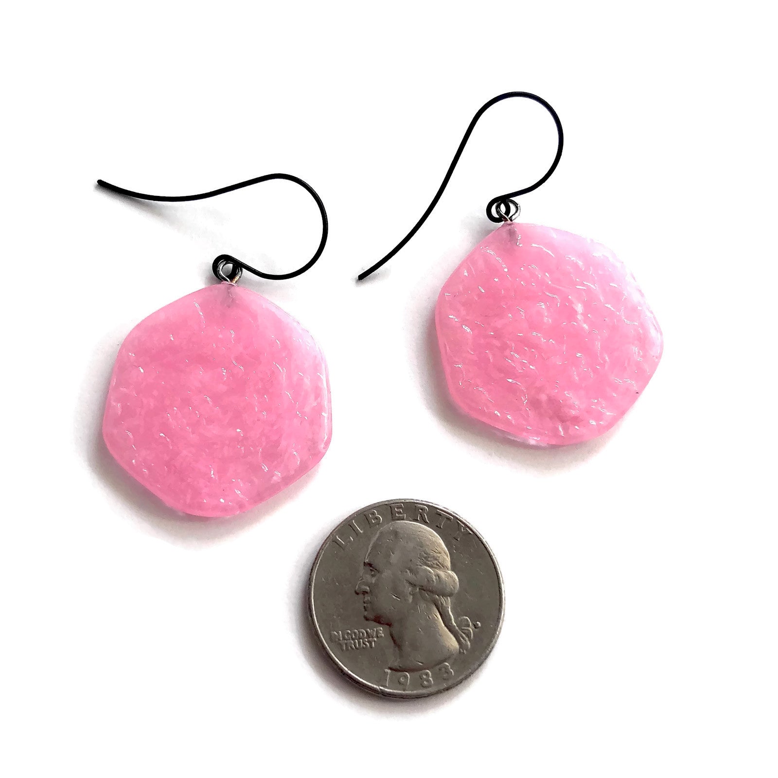 pink statement earrings