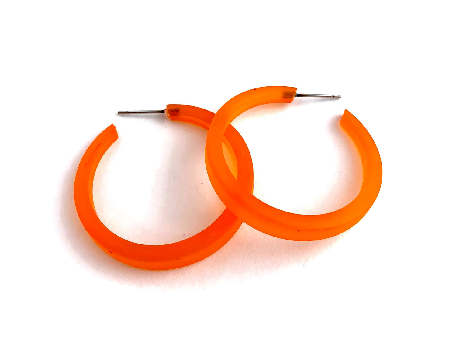 orange acrylic hoops