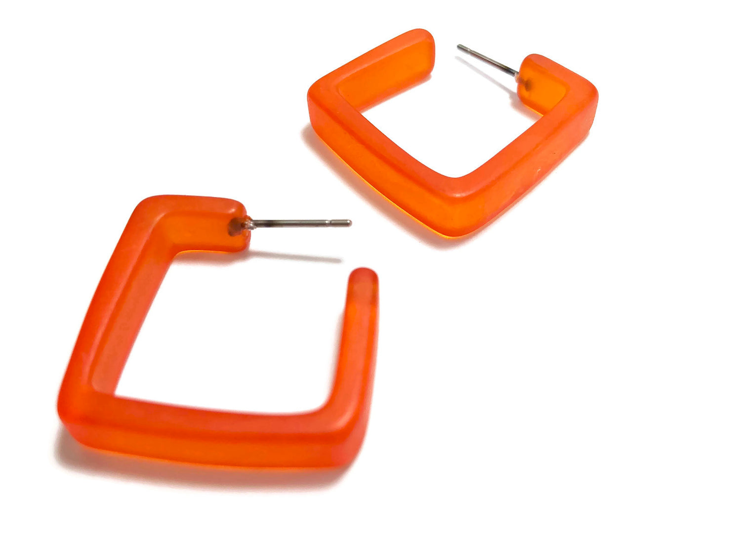 bright orange acrylic hoops