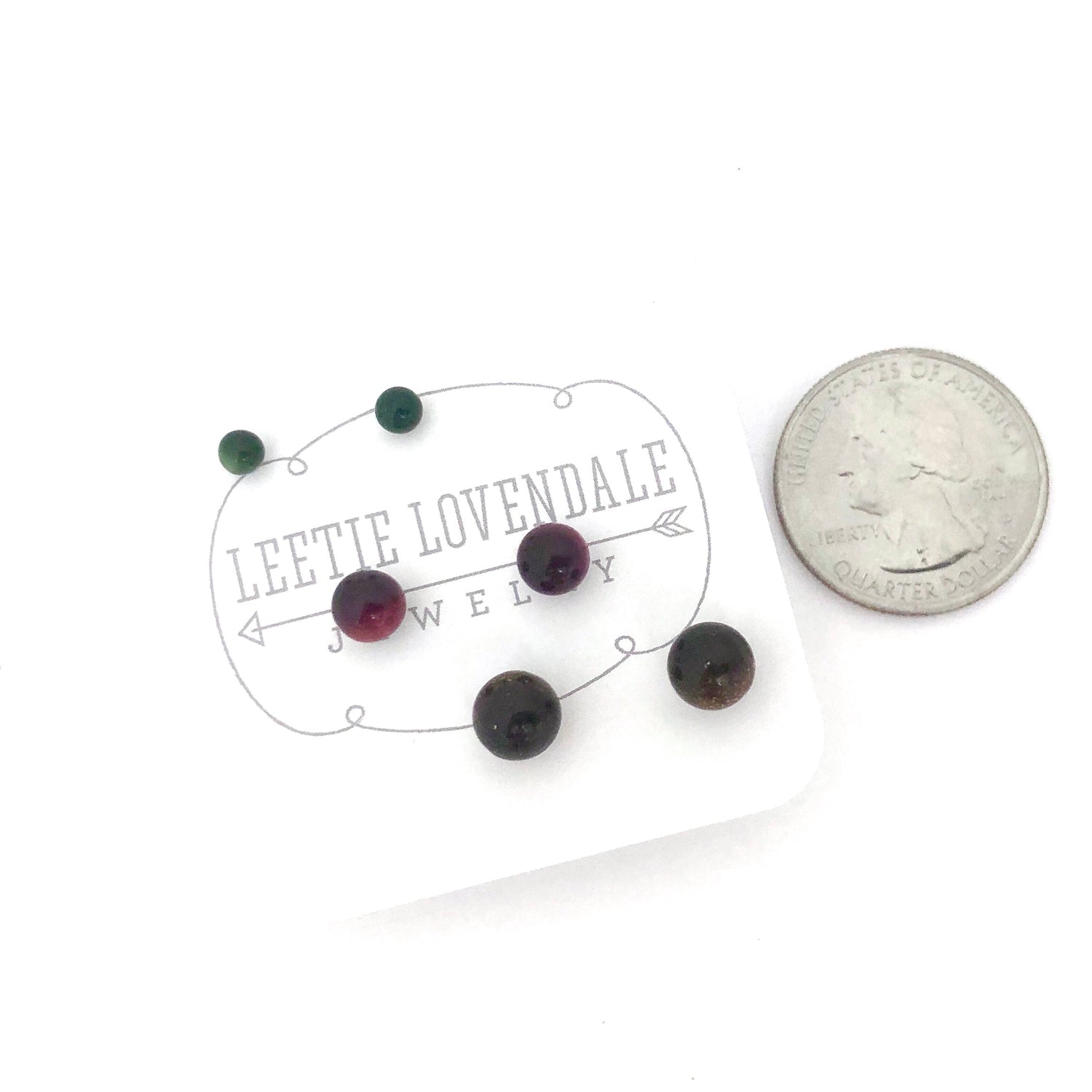 red moonglow studs