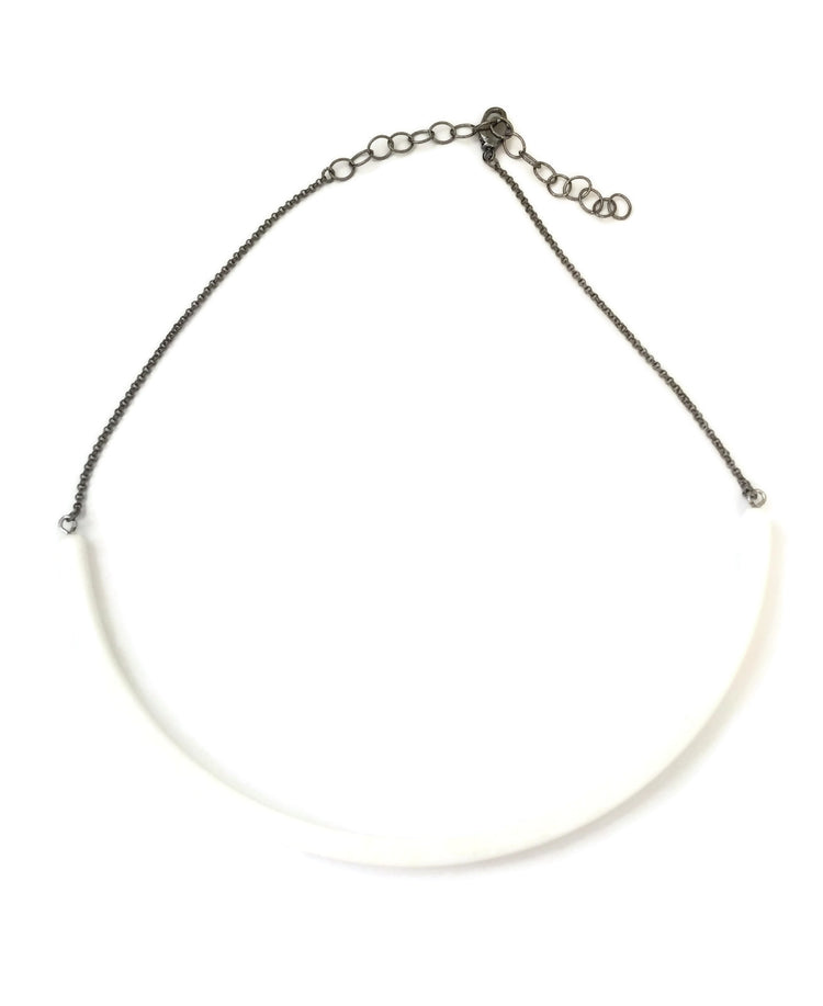 white plastic necklace